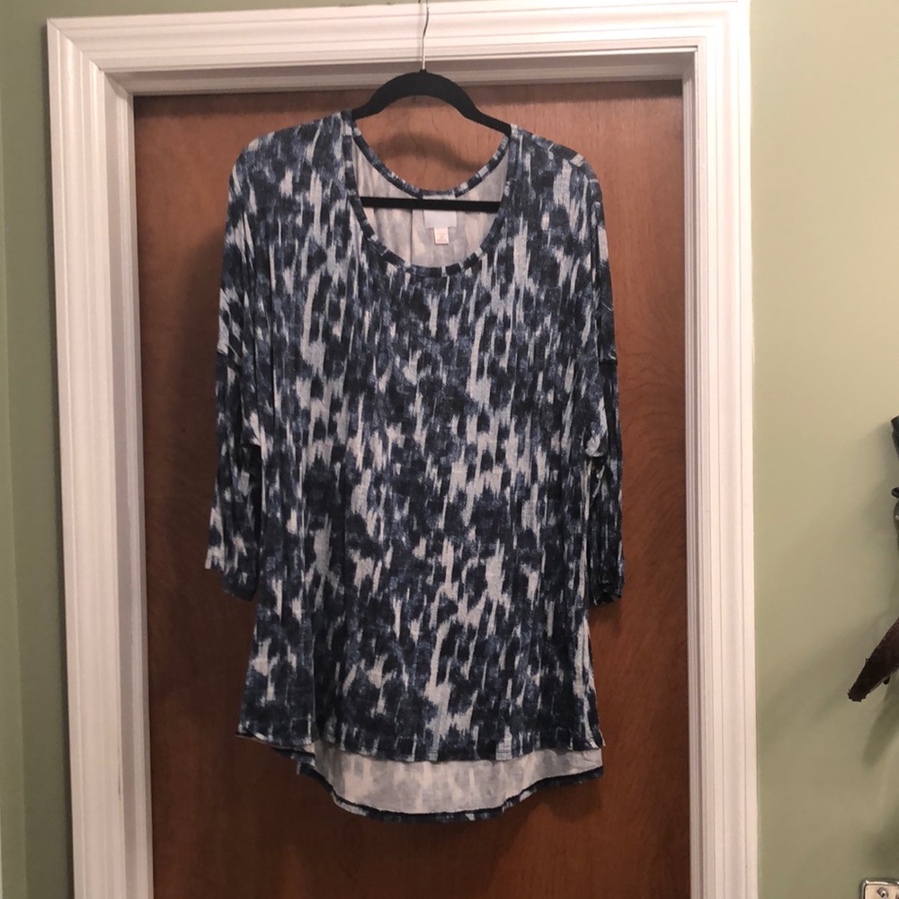 Dress Barn blouse, rayon and spandex.